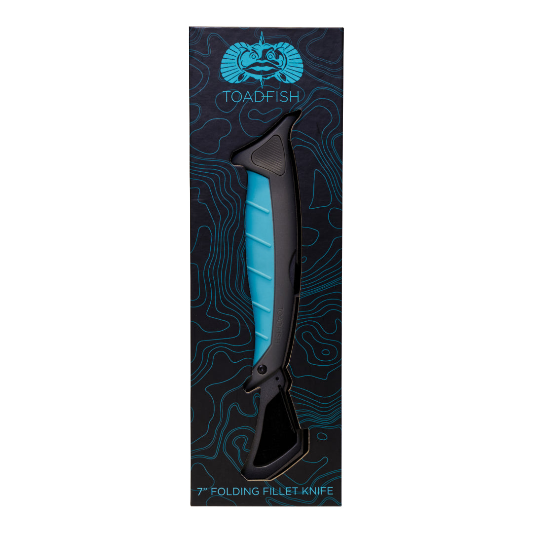 Folding fillet knife with blue handle and black blade in Toadfish packaging