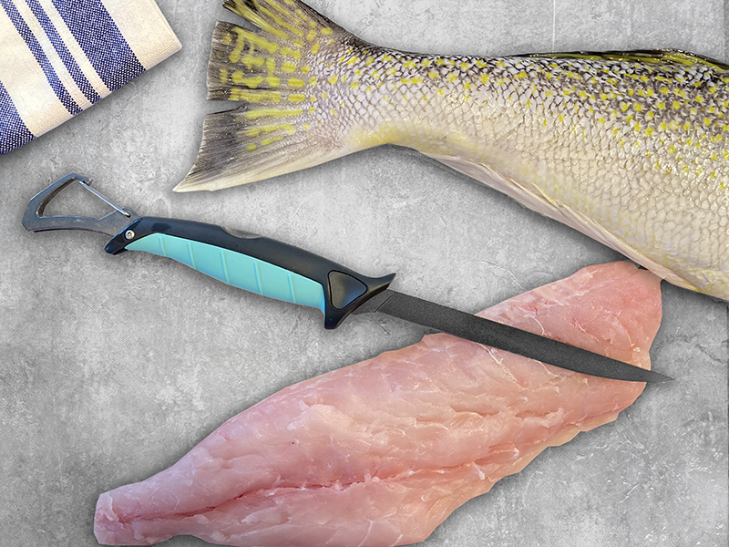 Toadfish Stowaway 7" Folding Fillet Knife Filleting a fish